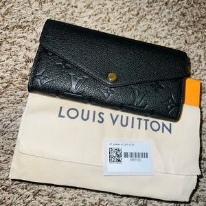 Authentic Louis Vuitton Sara Wallet